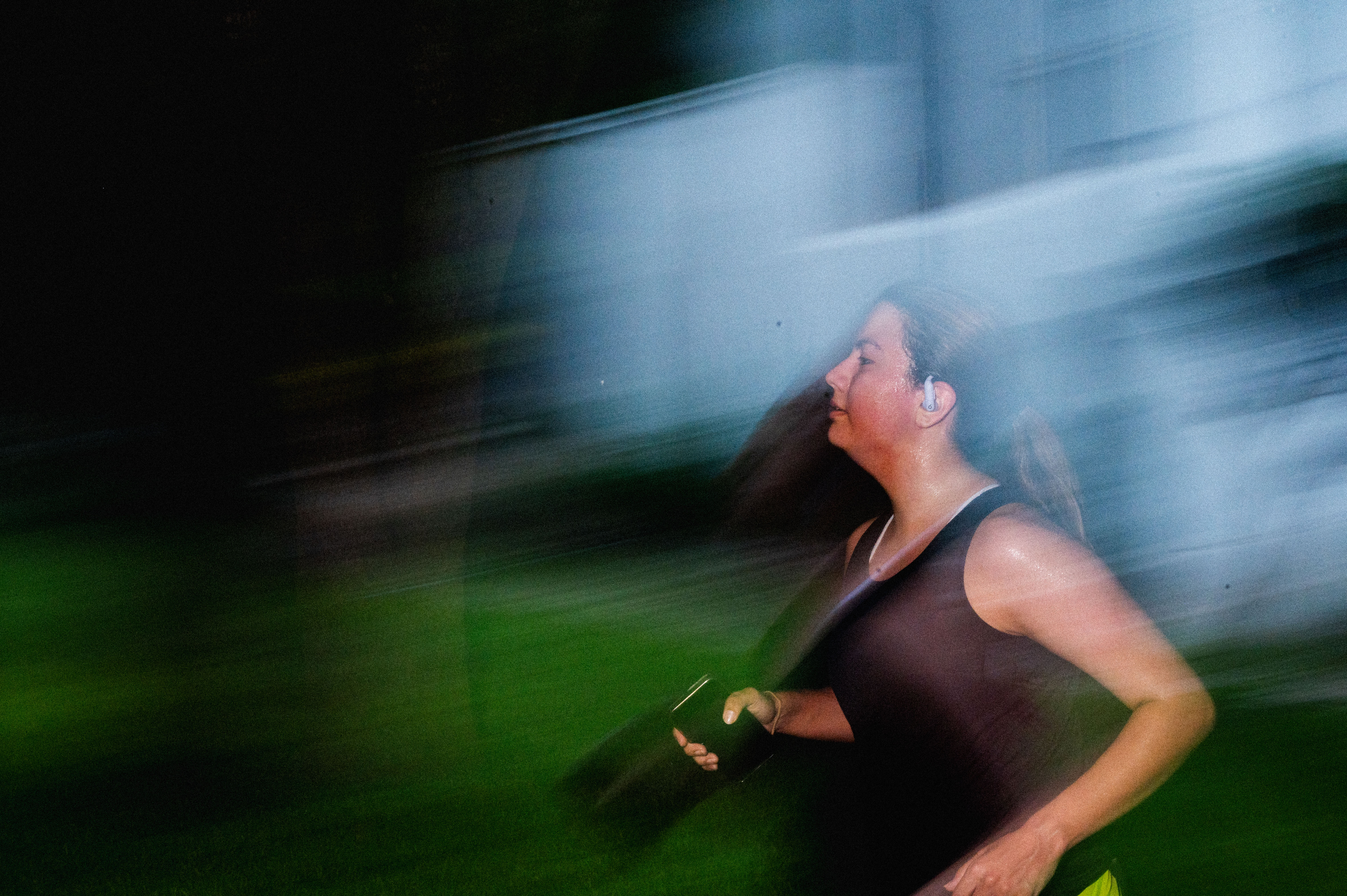 Brooks runner motion blur dark moody brand lifestyle photography