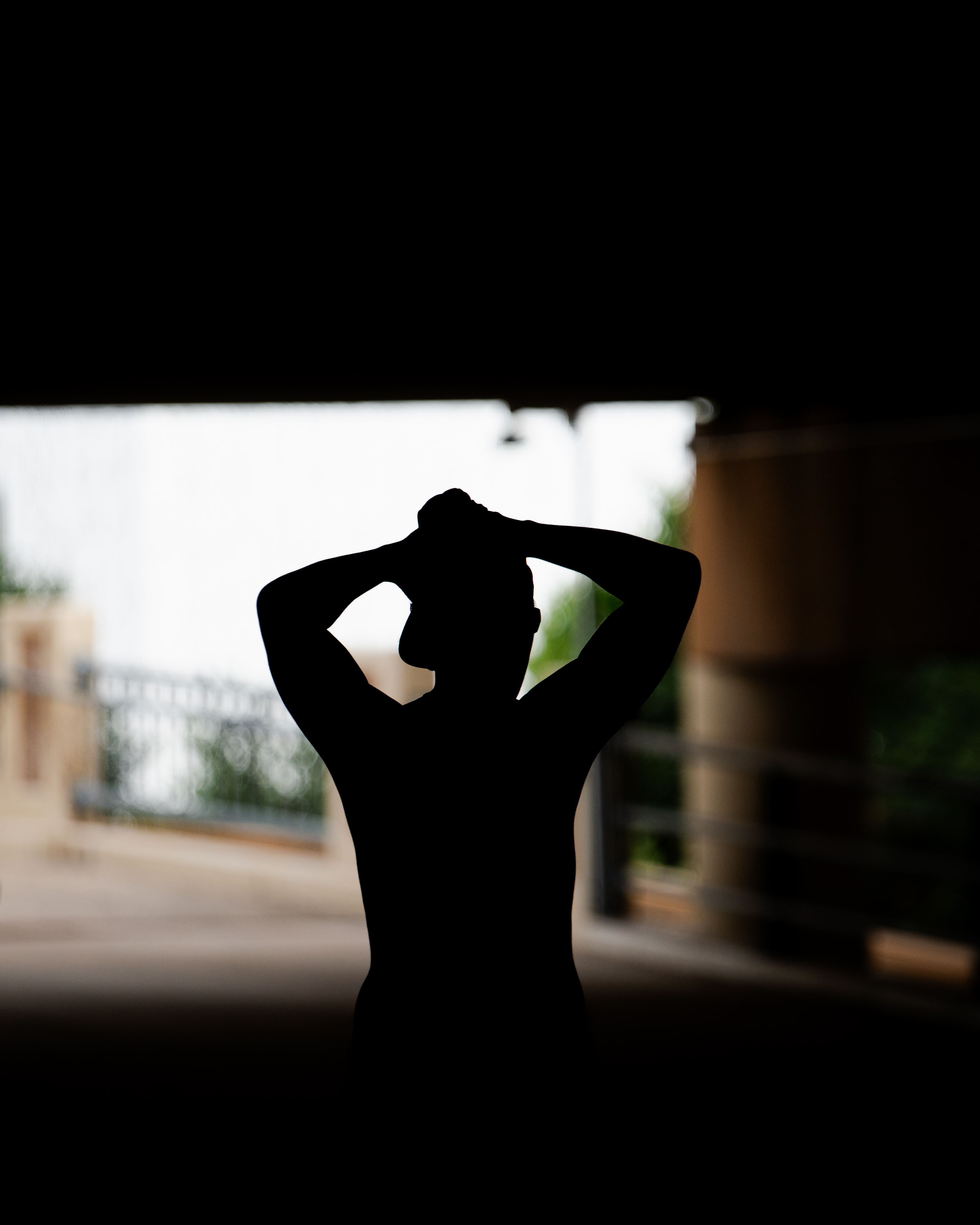 Athlete silhouette underpass black and white editorial sports photography