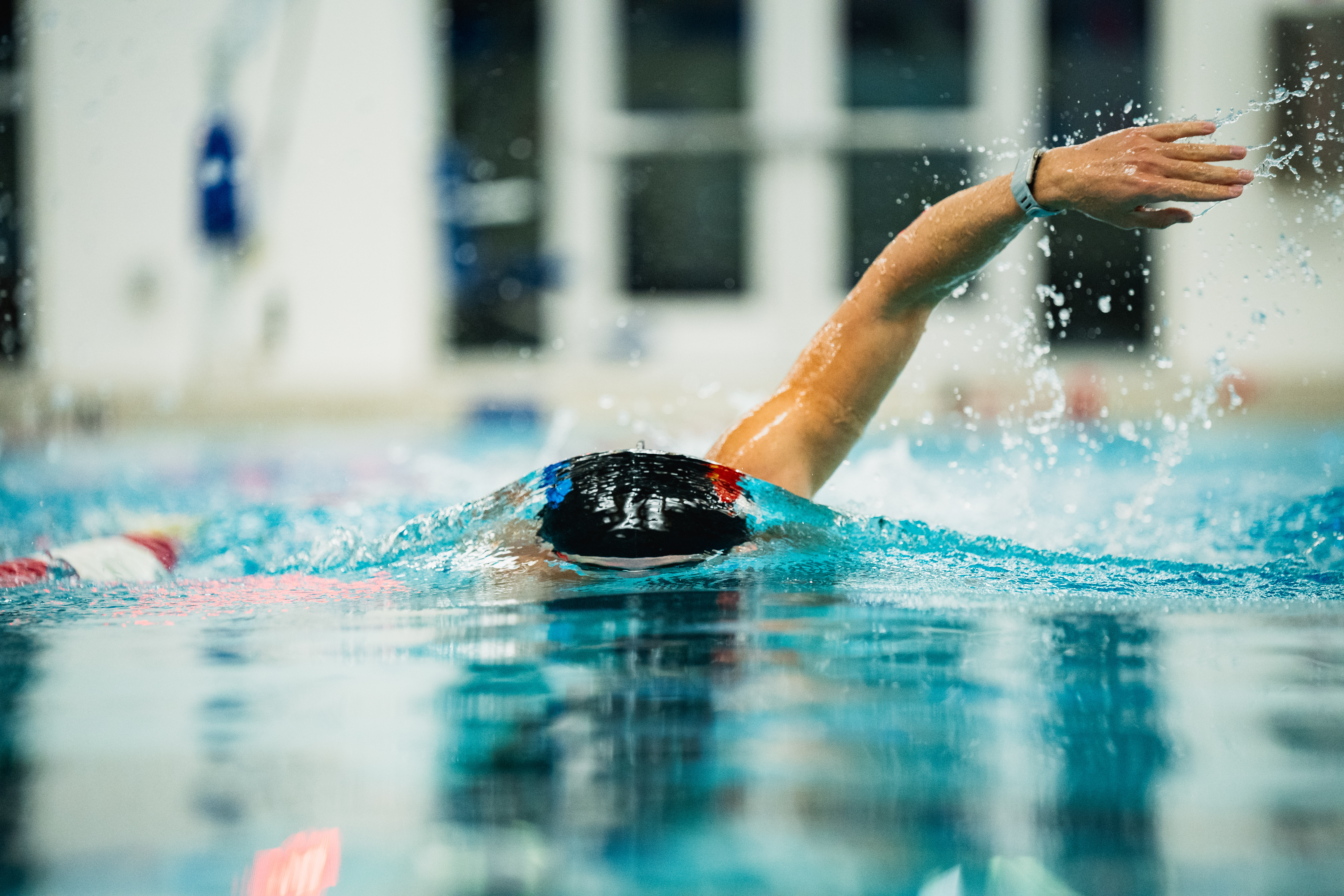 Competitive swimmer freestyle stroke editorial aquatics photography El Paso