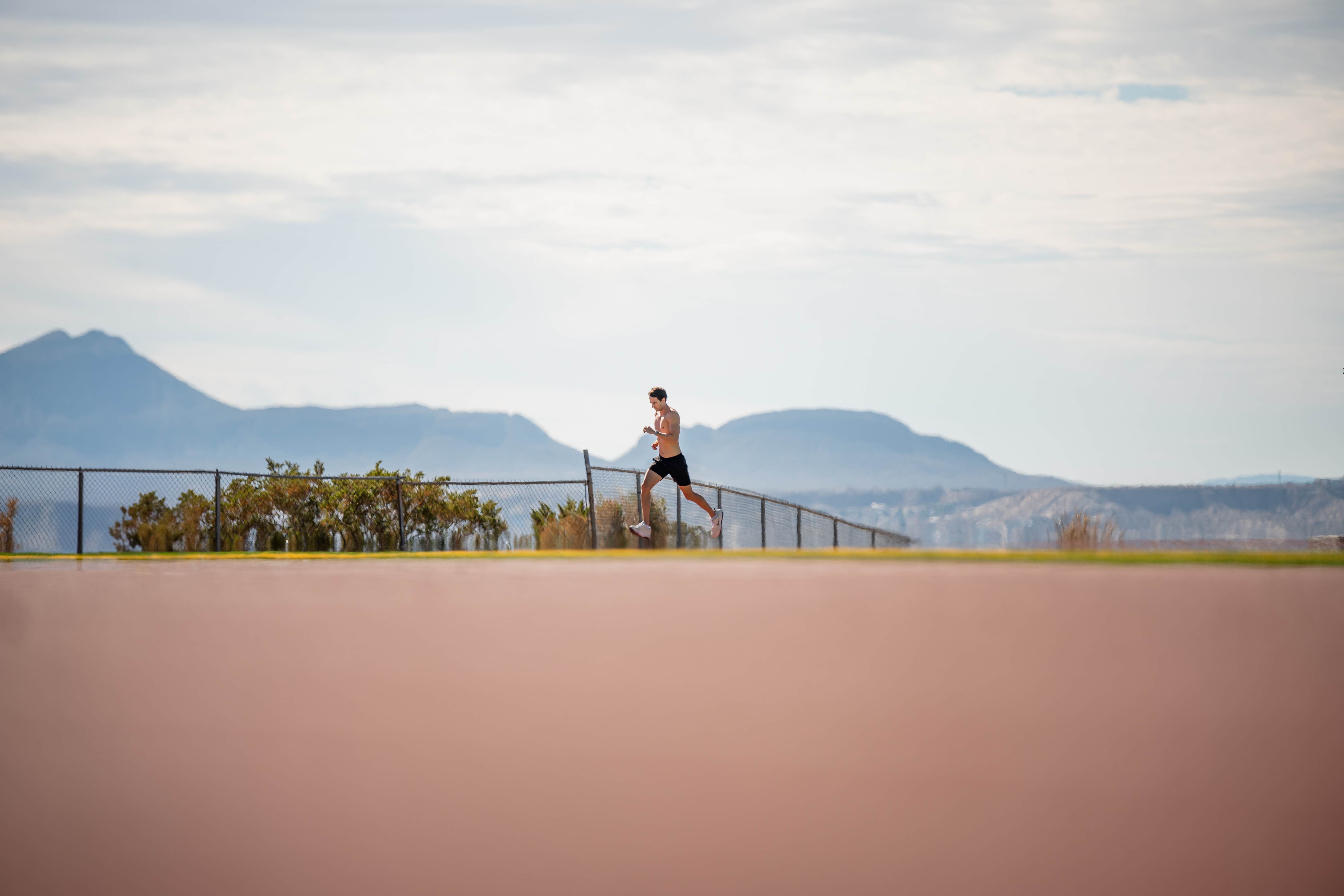 Runner athlete portrait El Paso mountains landscape sports photography
