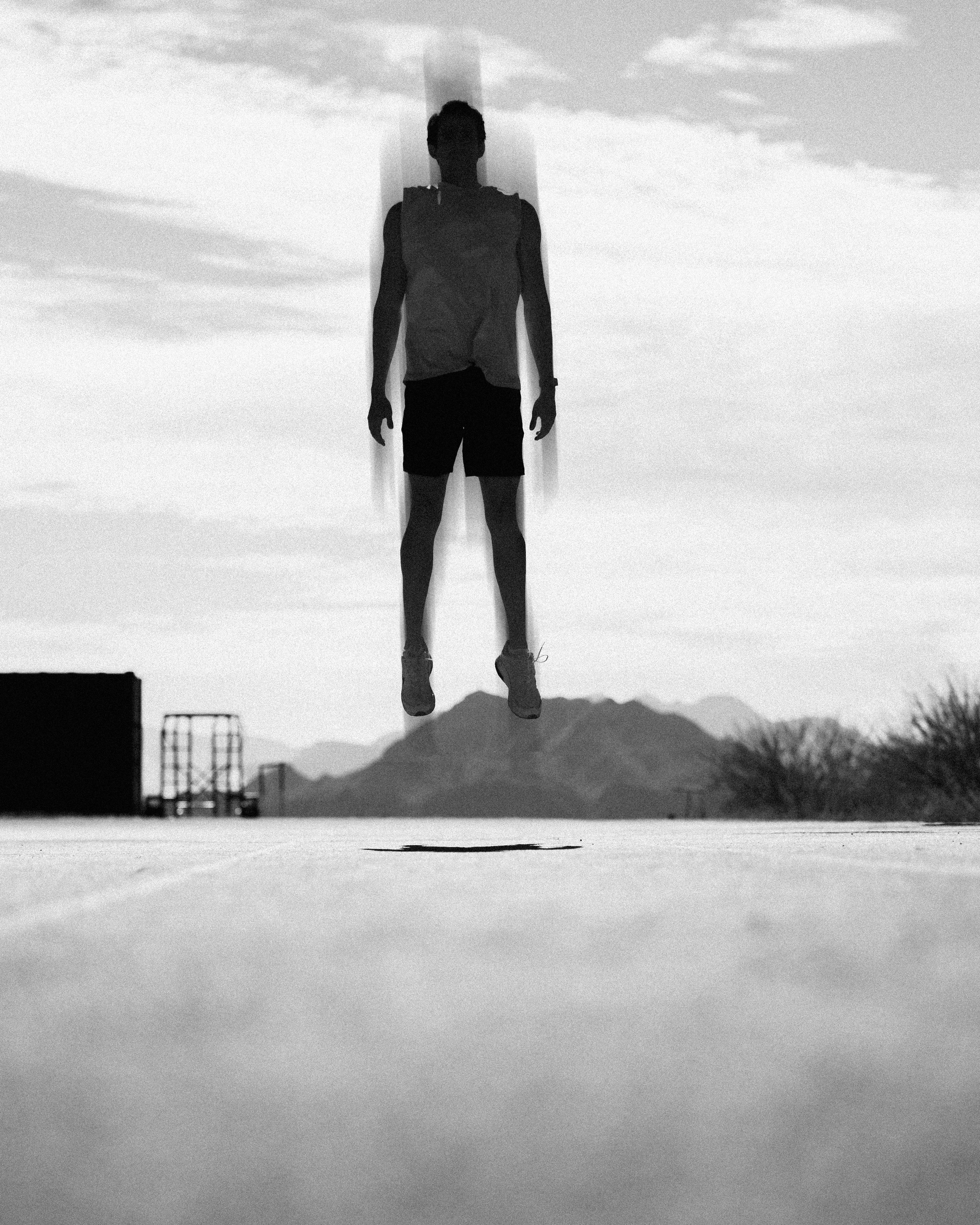 Swimmer surreal floating black and white fine art sports photography