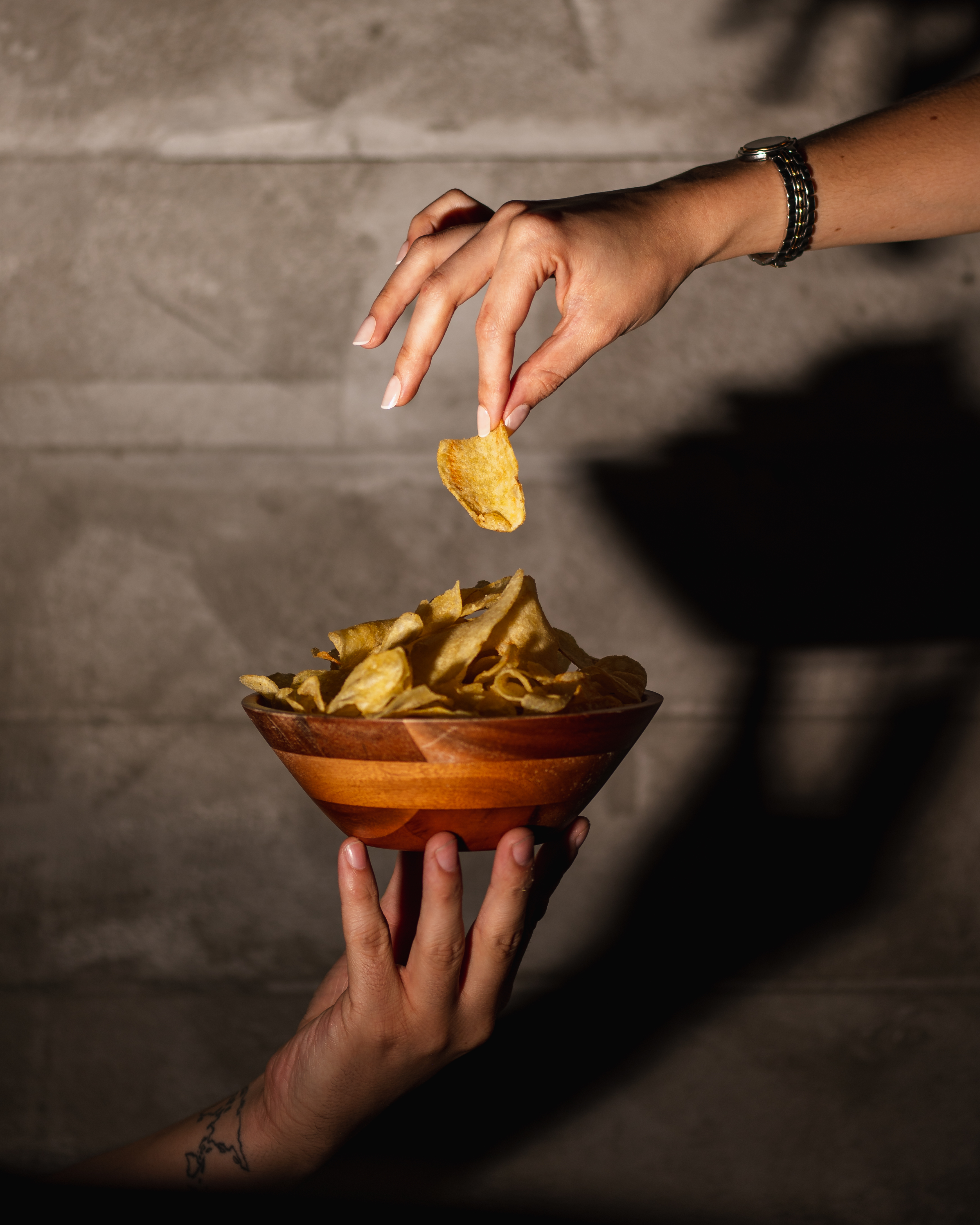 Food photography chips being plated at The Bunker San Antonio