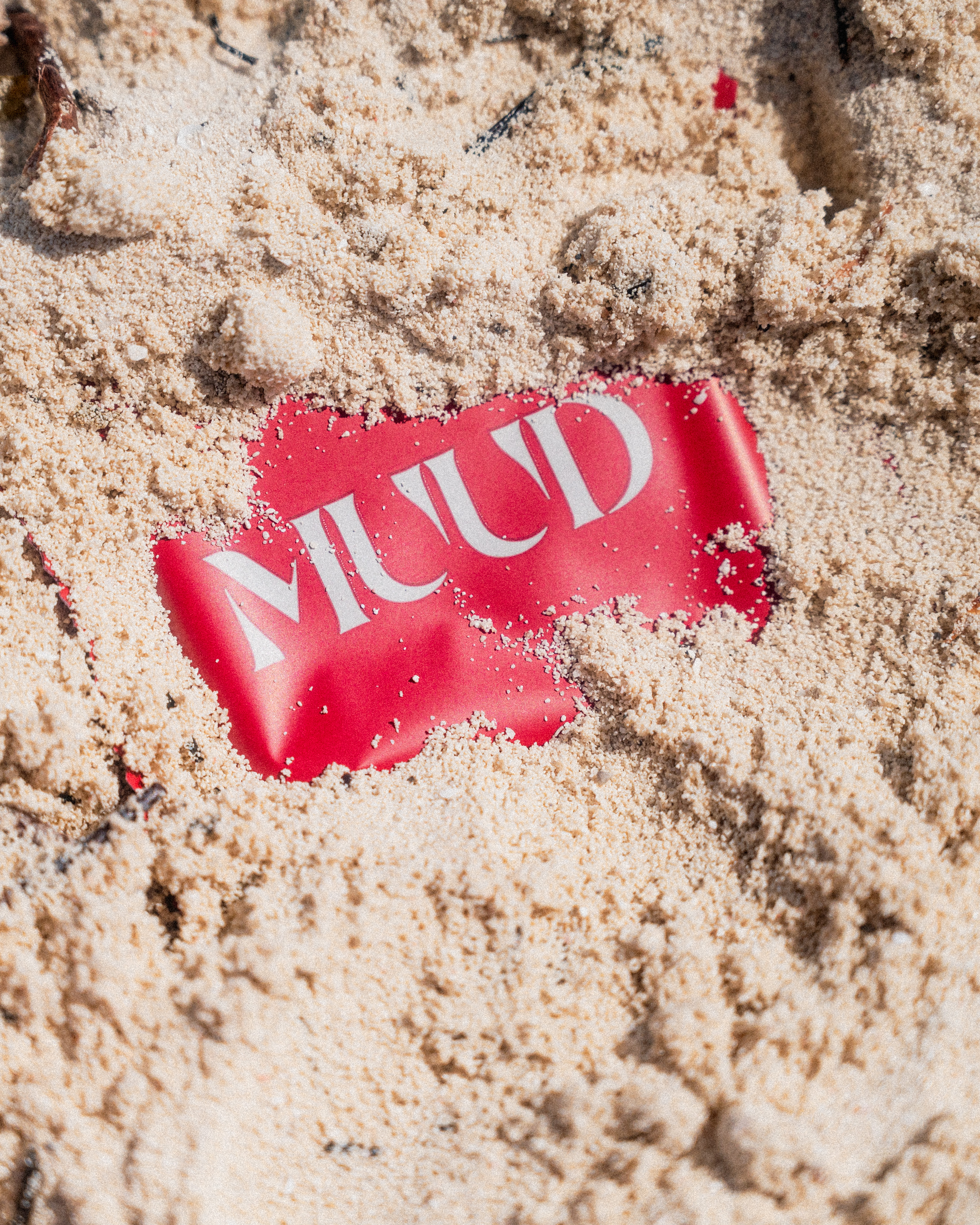 MUUD supplement product photography on sand Texas lifestyle brand